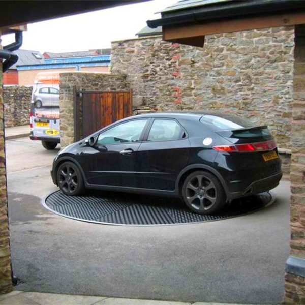 Car Turntable Platform with Pin-Gear Drive Effortlessly solve driveway challenges and limited parking access with our advanced car turntable platform. Designed for both indoor and outdoor use, this rotating platform offers smooth, reliable, and low-maintenance operation, ensuring convenience and enhanced functionality. Innovative Design and Construction Our car turntables are built with durability and precision in mind. The turntable’s pin-gear drive mechanism ensures smooth operation with minimal wear and tear, outclassing traditional friction drive systems that are prone to noise and higher maintenance. Pin Tooth Plate: Crafted from 10mm thick steel, precision-cut using CNC machinery, and treated for maximum durability. Nylon Components: High-strength nylon gears and wheels deliver superior abrasion and corrosion resistance while significantly reducing operational noise. Adjustable Height: Equipped with four supporting bolts and a central seat with adjustable shaft sleeves, the turntable can accommodate uneven installation surfaces. Seamless Functionality and Efficiency The car turntable offers unparalleled rotational capabilities, making it an ideal solution for tight parking spaces and restricted driveway access. Rotation and Capacity: Capable of 360° continuous rotation at variable speeds (0.2–1 RPM), the turntable can support weights ranging from 3,000 to 8,000 kg, making it suitable for a wide range of vehicles. Mesa Options: Choose from multiple diameter sizes (4m to 9m) and materials, including density board, plywood, and pattern aluminum alloy, to match your specific requirements. Advanced Control and Safety Features Our platform is designed with user convenience and safety in mind. Control Options: Operate the turntable using manual control, remote control, or angle-specific rotation control, ensuring precision and ease of use. Reliable Motor and Drive: The AC frequency conversion brake motor ensures smooth engagement of the main gear and stable rotation. Key Advantages Over Competitors Our car turntable stands out with its innovative design and cutting-edge features: Pin-Gear Drive Mechanism: Provides superior reliability, lower maintenance, and quieter operation compared to friction-drive systems. Noise Reduction: High-strength nylon gears and wheels significantly reduce noise levels during operation. Customizable Options: Choose from various sizes, materials, and control modes to meet your unique needs. Versatile Applications Whether you need a turntable for a residential driveway, a commercial garage, or an industrial parking lot, this platform offers unmatched versatility and performance. Upgrade your parking experience with our Car Turntable Platform with Pin-Gear Drive—a reliable and innovative solution for modern parking challenges.