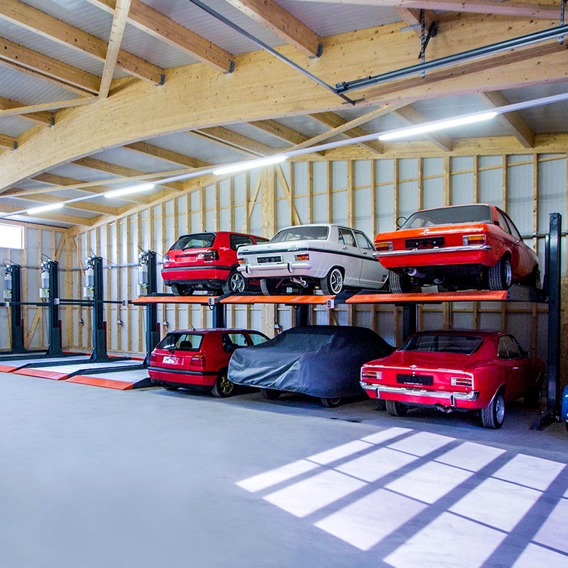 2 Post Hydraulic Parking Lift in Dubai and UAE Simple parking, simple life — stack cars vertically to double space. Fast install, low maintenance. Compact parking that expand the possibilities. With 2 post 2 level parking lift , the car storing space does not just acquire new automated equipment, but also there appears a space thought out to every centimeter. From private garages to dealerships and public parking lots, HP1120 parking lifts are the most cost-effective solution for organizing and saving parking space for cars weighing up to 2000kg. Its simplified structural design allows to shorten installation period by approx. 30%. - For dependent parking - Single platform for 2 vehicles - Platform load capacity: 2000kg - Vehicle height: up to 1750mm on ground floor - Usable platform width: 2200mm as standard - Compact structure design requires minimized installation space - Automatic shut-off when operator releases key switch - Auto lock release makes operation easier - Sharing post feature allows tandem installations in minimum space - Galvanized waving platform, high-heel friendly - Low maintenance cost - Fine surface coating supported by Akzo Nobel powders Specifications Model 1 2 3 Lifting capacity 2700kg /6000lbs 2300kg /5000lbs 2000kg/4400lbs Lifting height 2100mm /6'10" 2100mm /6'10" 1850mm /6'1" Usable platform width 2100mm /6'10" 2100mm /6'10" 2200mm /7'3" Outer width 2547mm /8'4" 2547mm /8'4" 2540mm /8'4" Application SUV+SUV SUV+Sedan Sedan+Sedan Power pack 2.2Kw Power supply 100-480V, 50/60Hz Operation mode Key switch Operation voltage 24V 24V 220v Safety lock Dynamic anti-falling lock Dynamic anti-falling lock Positioning lock Lock release Electric auto release Lifting time